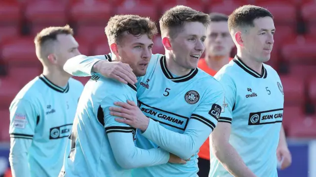 Cliftonville celebrate Alex Parsons' goal