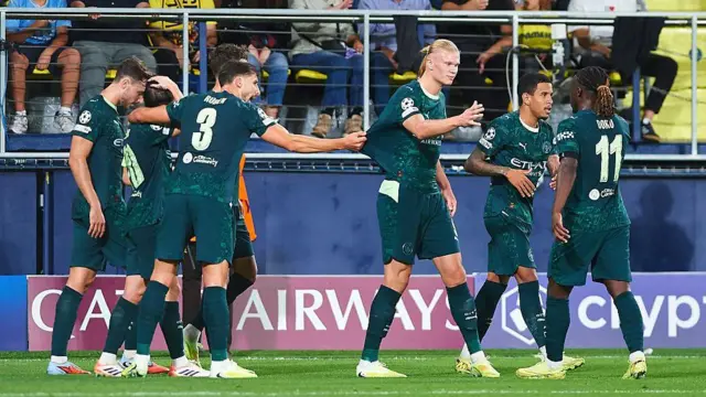 Manchester City players celebrate