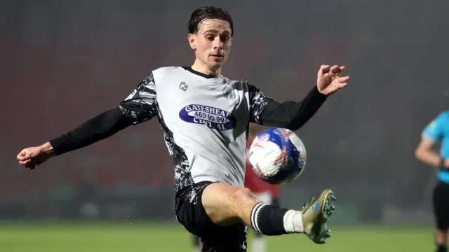 Fenton John controls the ball while playing for Gateshead 