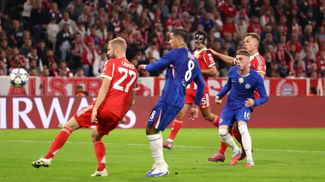 Chelsea's Cole Palmer scores his team's first goal against Bayern Munich
