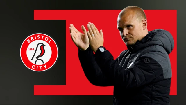 Liam Manning applauding Bristol City fans after play-off loss