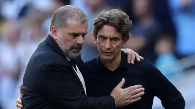 Ange Postecoglou embraces Thomas Frank