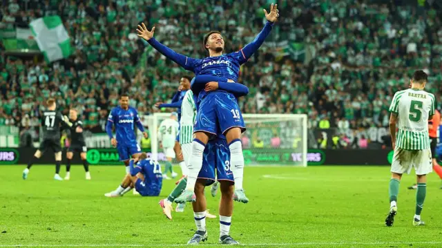Jadon Sancho celebrates scoring against Real Betis in the Conference League final