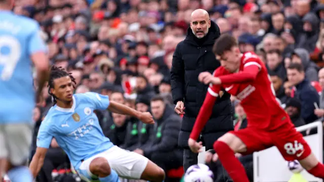 Pep Guardiola managing at Anfield