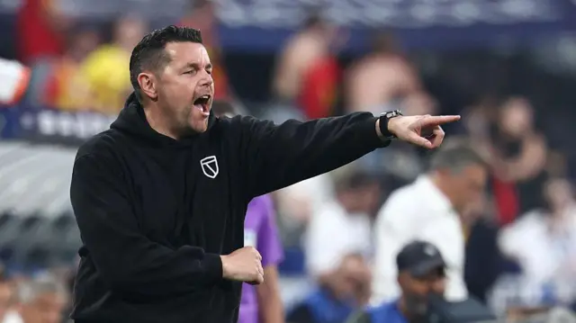 Lens head coach Pierre Sage gestures to his players