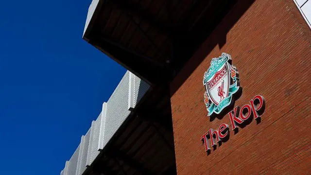 General view of Liverpool 'The Kop' sign on side of Anfield