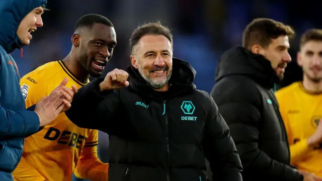 Wolves manager Vitor Pereira celebrates victory over Leicester with his players