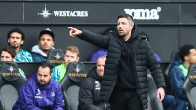 Alan Sheehan in the dugout during Swansea's win over Middlesbrough