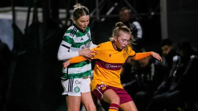 Kayla Jardine (right) in action for Motherwell