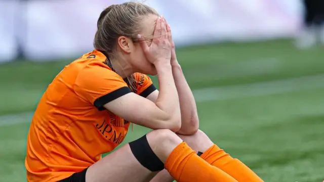 Glasgow City's Fiona Brown receives on-pitch treatment during a Scottish Women's Premier League match between Rangers and Glasgow City at Broadwood Stadium