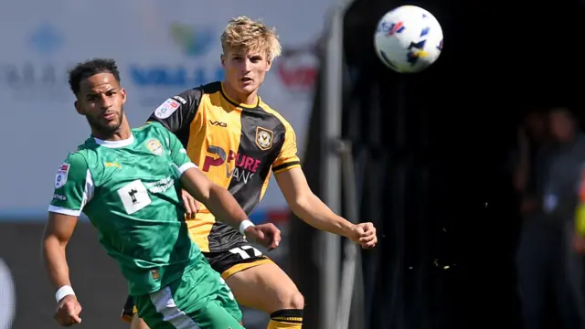 Tom Davies clears the ball for Newport County against Notts County in League Two