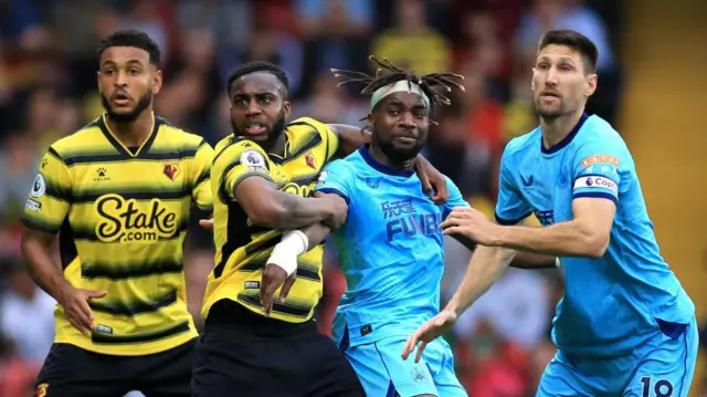 Watford and Newcastle players contend for the ball