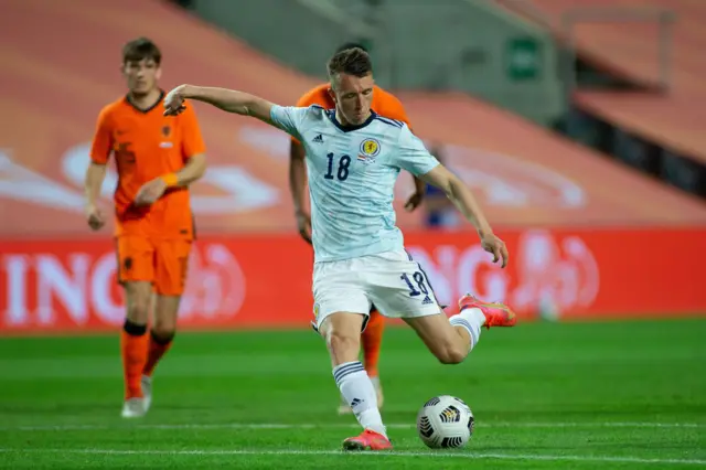 David Turnbull strikes the ball for Scotland against the Netherlands