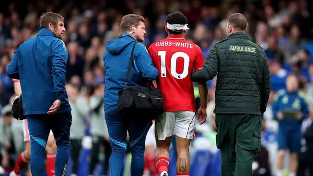 Morgan Gibbs-White walks off the pitch with a bandaged head