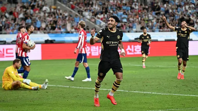 Omar Marmoush celebrates after scoring his second goal