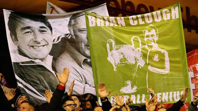 Brian Clough flags held in stand by Forest fans