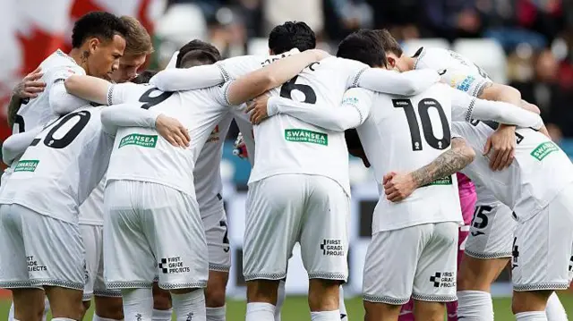 Swansea players in a huddle last season