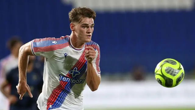  Justin Devenny of Crystal Palace chases after the ball