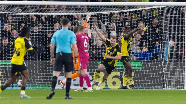 Ryan Porteous celebrates a Watford goal against Swansea