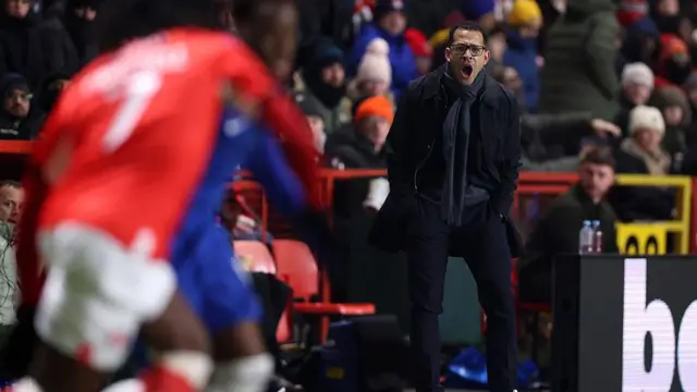 Liam Rosenior, Manager of Chelsea, reacts