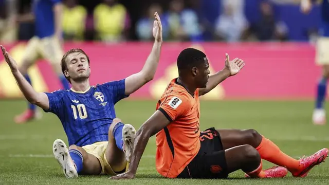 Benjamin Nygren of Sweden and Denzel Dumfries of the Netherlands
