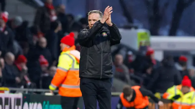 Wrexham manager Phil Parkinson applauds