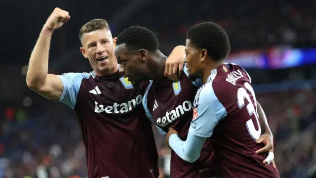 Aston Villa players celebrate goal