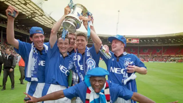 Paul Rideout lifts the FA Cup with his team mates