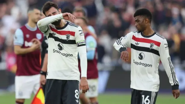 Dejection for Manchester United's Bruno Fernandes at the end of the match during the Premier League match between West Ham United FC and Manchester United FC at London Stadium