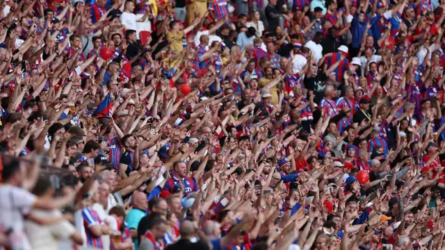 Crystal Palace fans celebrating in the stands during the Conference League final 