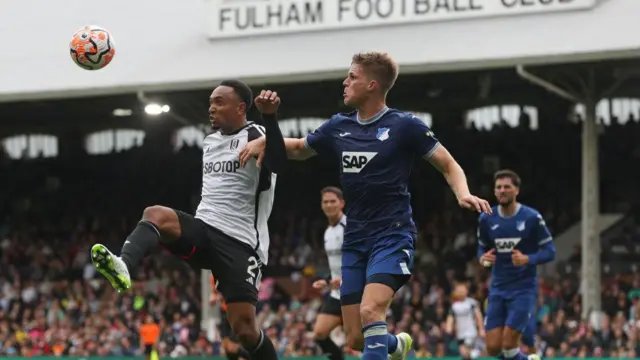 Kenny Tete of Fulham and Marius Bulter of Hoffenheim