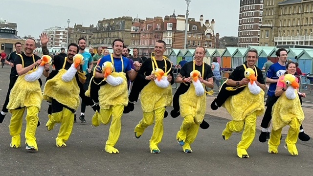 Tom Brown and friends running in emu costumes