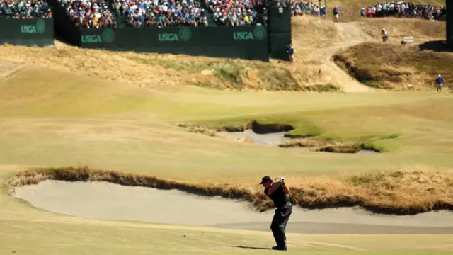 Phil Mickelson hits his second shot