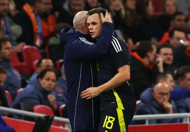 Shankland hugs manager Steve Clarke