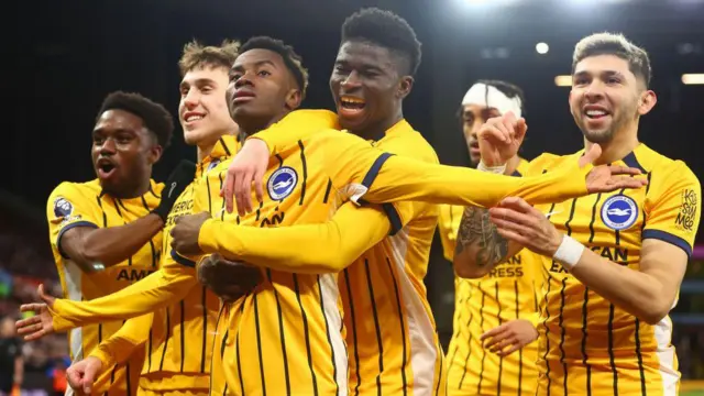 Simon Adingra celebrates scoring for Brighton