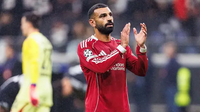 Mohamed Salah applauds the Liverpool fans