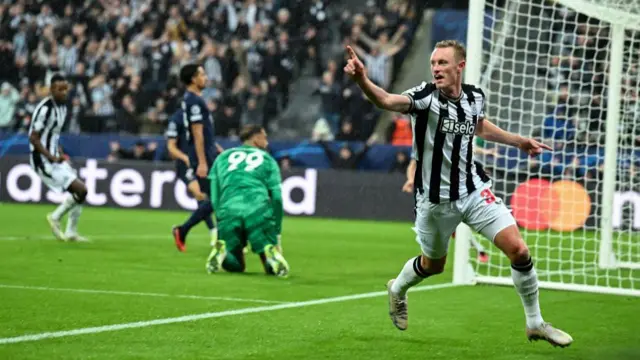 Sean Longstaff celebrates after scoring against Paris St-Germain