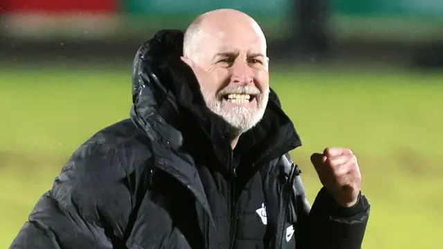 Paul Haveron celebrates the win over Ballymena at the final whistle