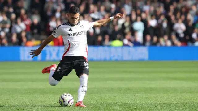 Andreas Pereira kicks the ball