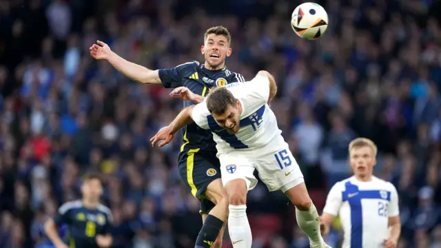 Scotland's Ryan Christie and Finland's Arttu Hoskonen battle for the ball during an international friendly at Hampden Park, Glasgow.