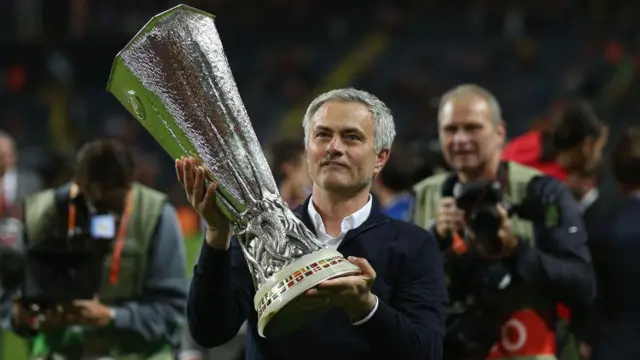 Jose Mourinho lifts the Europa League trophy for Manchester United