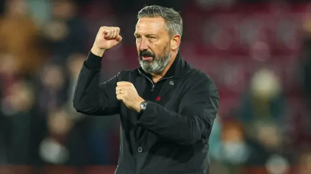 Hearts head coach Derek McInnes celebrates
