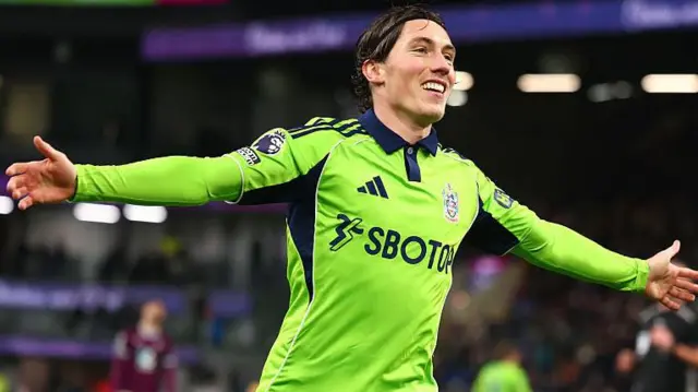 Harry Wilson with his arms outstretched celebrating his goal against Burnley