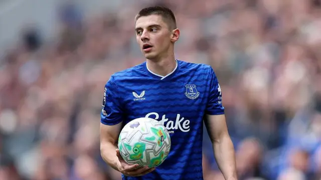 Vitalii Mykolenko in action for Everton