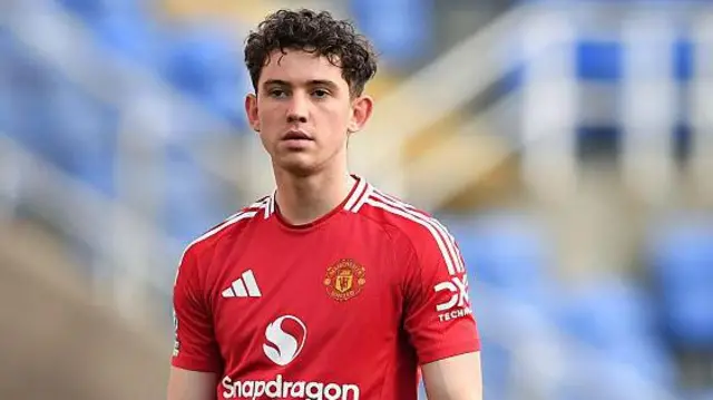 Manchester United defender Louis Jackson in action