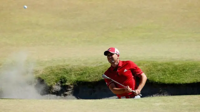 Sergio Garcia hits a shot out of the bunker