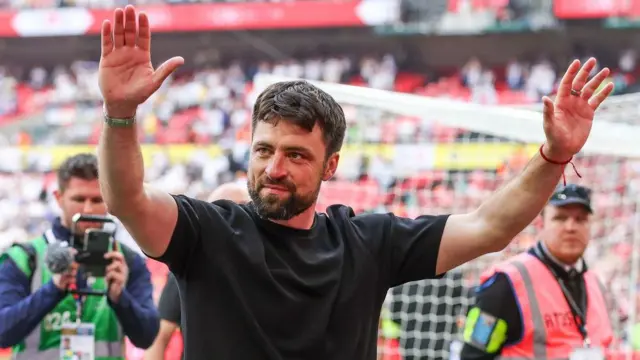 Russell Martin celebrates victory over Leeds in the play-off final