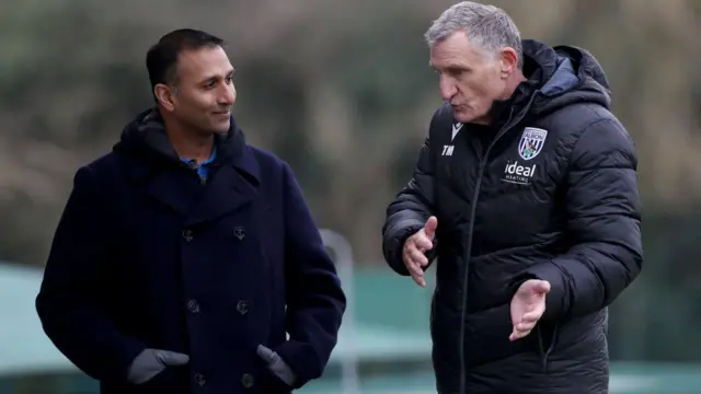 West Brom owner Shilen Patel in discussion with Tony Mowbray