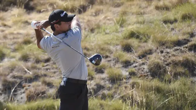 Jason Day hits a tee shot