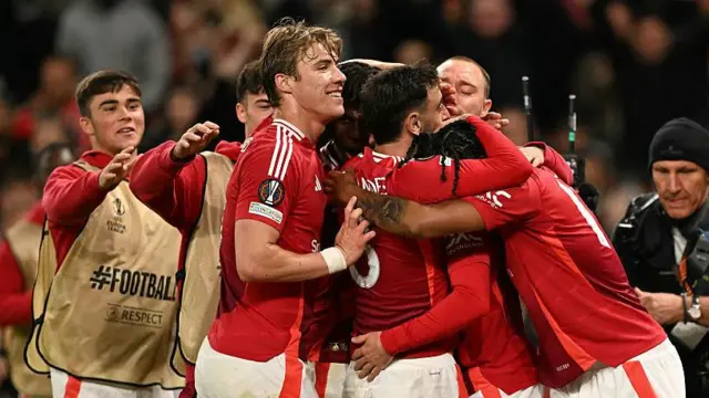 Manchester United players celebrate